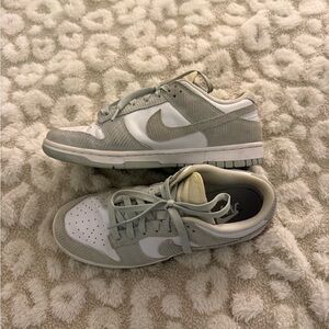 woman’s green corduroy dunks